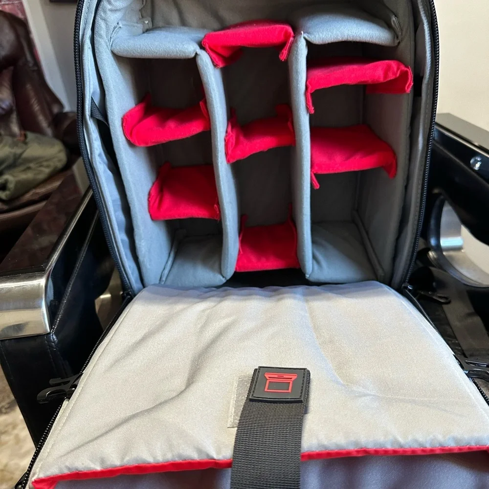 A backpack for a professional photographer. There's space for lenses
